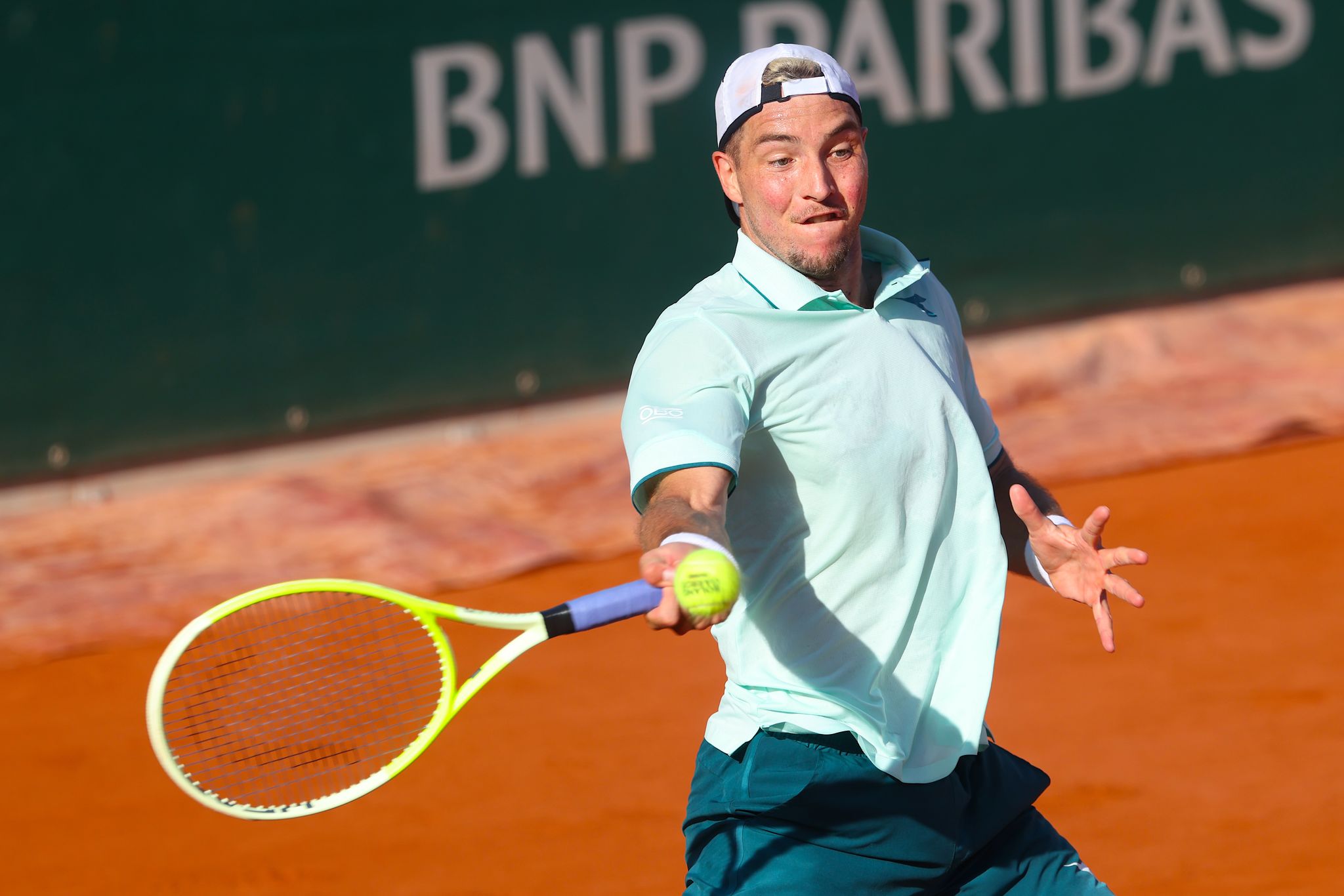 Jan-Lennard Struff bei einem Vorhandschlag.