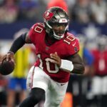 Quarterback Jalon Daniels wirft für die Tampa Bay Buccaneers gegen die Dallas Cowboys einen Touchdown.