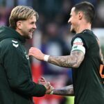 Niclas Füllkrug (l) sieht die Debatte um ein mögliches DFB-Comeback entspannt.